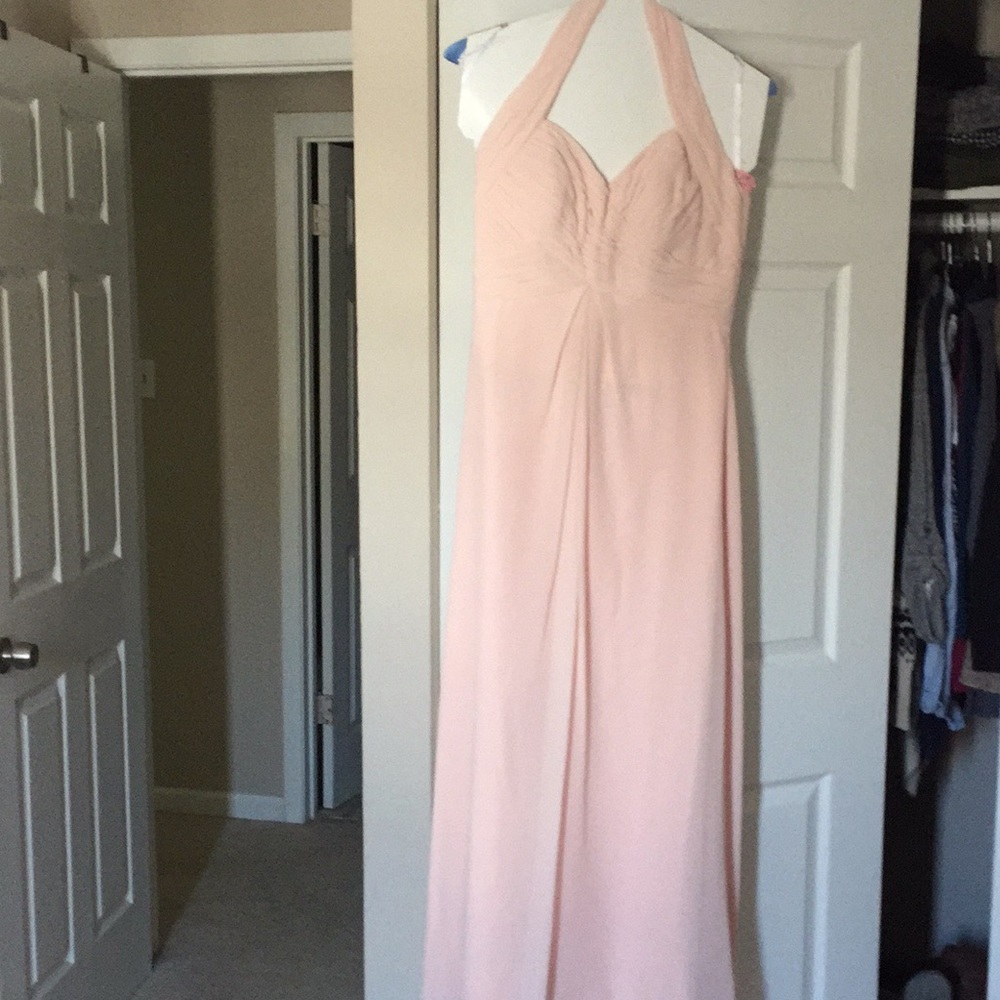 Long, pink, halter cut bridesmaid dress